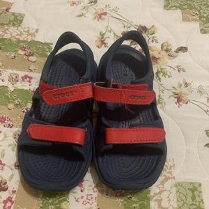 Boys size 9 crocs.  Navy color and like new